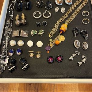 COSTUME JEWELRY 
2 necklaces 
18 pairs of earrings